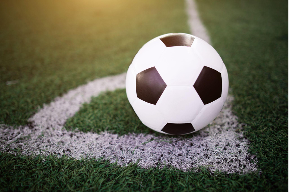 soccer white ball in corner line